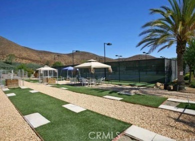 For Information Call Bill Robinson : This home is thoughtful in on Menifee Lakes Country Club - Lakes in California - for sale on GolfHomes.com, golf home, golf lot