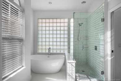 Embrace this beautiful crisp clean home with a harmonious on Monarch Country Club in Florida - for sale on GolfHomes.com, golf home, golf lot