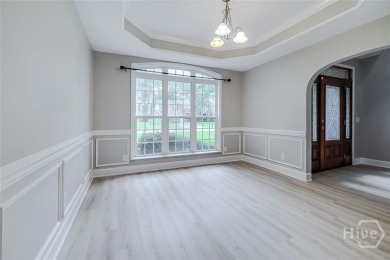 This stunning brick home offers a wonderful open floor plan with on Lost Plantation Golf Club in Georgia - for sale on GolfHomes.com, golf home, golf lot
