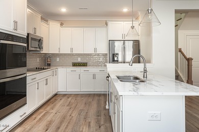 If you love true ranch-style living-or want a home perfect for on Kings Grant Golf and Country Club in North Carolina - for sale on GolfHomes.com, golf home, golf lot