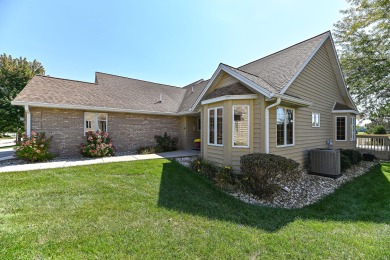 Welcome to this ranch-style condominium that's walking distance on Rivermoor Golf Club in Wisconsin - for sale on GolfHomes.com, golf home, golf lot