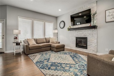 Tucked inside a premier resort-style neighborhood, this stunning on Golf Club of Creekmoor in Missouri - for sale on GolfHomes.com, golf home, golf lot