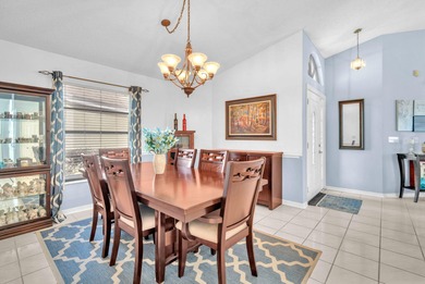 Beautifully maintained home located in a man-gated, golf course on Atlantic National Golf and Country Club in Florida - for sale on GolfHomes.com, golf home, golf lot