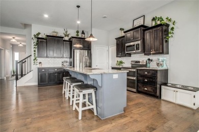 Tucked inside a premier resort-style neighborhood, this stunning on Golf Club of Creekmoor in Missouri - for sale on GolfHomes.com, golf home, golf lot