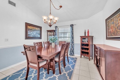 Beautifully maintained home located in a man-gated, golf course on Atlantic National Golf and Country Club in Florida - for sale on GolfHomes.com, golf home, golf lot