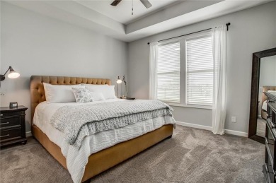 Tucked inside a premier resort-style neighborhood, this stunning on Golf Club of Creekmoor in Missouri - for sale on GolfHomes.com, golf home, golf lot