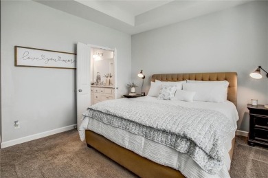Tucked inside a premier resort-style neighborhood, this stunning on Golf Club of Creekmoor in Missouri - for sale on GolfHomes.com, golf home, golf lot