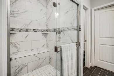 Tucked inside a premier resort-style neighborhood, this stunning on Golf Club of Creekmoor in Missouri - for sale on GolfHomes.com, golf home, golf lot