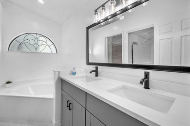 Beautifully maintained home located in a man-gated, golf course on Atlantic National Golf and Country Club in Florida - for sale on GolfHomes.com, golf home, golf lot