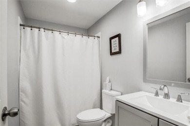 Tucked inside a premier resort-style neighborhood, this stunning on Golf Club of Creekmoor in Missouri - for sale on GolfHomes.com, golf home, golf lot