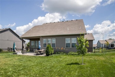 Tucked inside a premier resort-style neighborhood, this stunning on Golf Club of Creekmoor in Missouri - for sale on GolfHomes.com, golf home, golf lot