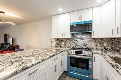 Lease purchase available. SPECTACULAR RIVERFRONT CONDO VILLA on Ocean Palm Golf Course in Florida - for sale on GolfHomes.com, golf home, golf lot