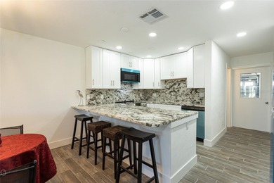 Lease purchase available. SPECTACULAR RIVERFRONT CONDO VILLA on Ocean Palm Golf Course in Florida - for sale on GolfHomes.com, golf home, golf lot