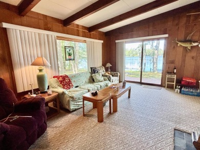 LAKEFRONT HOME - Fabulous 3 bedroom 2 bath home with amazing on Garland Resort and Golf Club  in Michigan - for sale on GolfHomes.com, golf home, golf lot