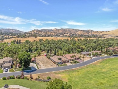Welcome to your dream home on the 15th tee box at River Island on River Island Country Club in California - for sale on GolfHomes.com, golf home, golf lot