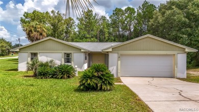 Spacious 4 BEDROOM home with 2 car garage on an OVERSIZED on Citrus Springs Country Club in Florida - for sale on GolfHomes.com, golf home, golf lot