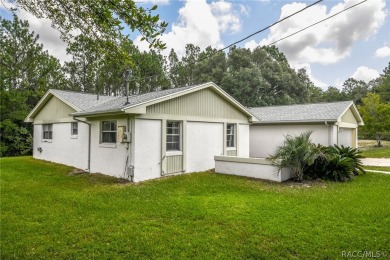 Spacious 4 BEDROOM home with 2 car garage on an OVERSIZED on Citrus Springs Country Club in Florida - for sale on GolfHomes.com, golf home, golf lot