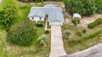 Spacious 4 BEDROOM home with 2 car garage on an OVERSIZED on Citrus Springs Country Club in Florida - for sale on GolfHomes.com, golf home, golf lot