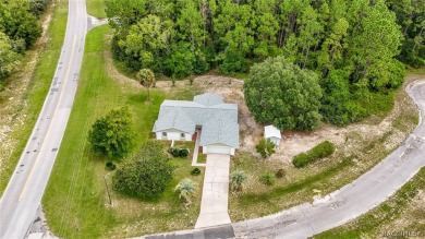 Spacious 4 BEDROOM home with 2 car garage on an OVERSIZED on Citrus Springs Country Club in Florida - for sale on GolfHomes.com, golf home, golf lot