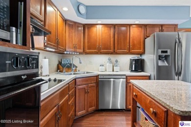 Experience tranquility and comfort in Brandenburg's premier on Doe Valley Country Club in Kentucky - for sale on GolfHomes.com, golf home, golf lot