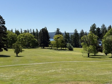 Nestled along the scenic shores of Discovery Bay and the on Discovery Bay Golf Club in Washington - for sale on GolfHomes.com, golf home, golf lot