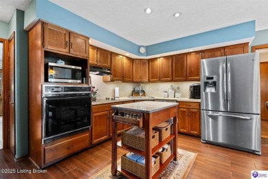 Experience tranquility and comfort in Brandenburg's premier on Doe Valley Country Club in Kentucky - for sale on GolfHomes.com, golf home, golf lot