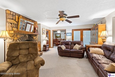 Experience tranquility and comfort in Brandenburg's premier on Doe Valley Country Club in Kentucky - for sale on GolfHomes.com, golf home, golf lot