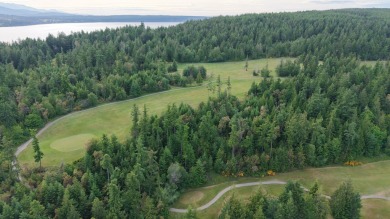 Nestled along the scenic shores of Discovery Bay and the on Discovery Bay Golf Club in Washington - for sale on GolfHomes.com, golf home, golf lot
