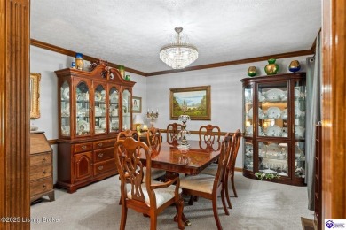 Experience tranquility and comfort in Brandenburg's premier on Doe Valley Country Club in Kentucky - for sale on GolfHomes.com, golf home, golf lot