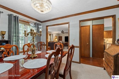 Experience tranquility and comfort in Brandenburg's premier on Doe Valley Country Club in Kentucky - for sale on GolfHomes.com, golf home, golf lot
