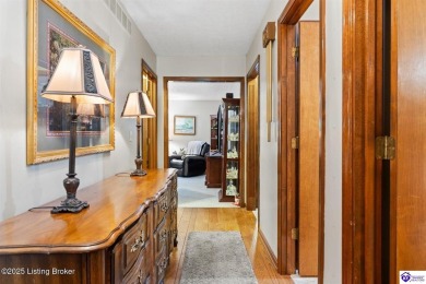 Experience tranquility and comfort in Brandenburg's premier on Doe Valley Country Club in Kentucky - for sale on GolfHomes.com, golf home, golf lot