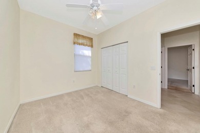 Freshly painted, move-in ready, and perfectly located this on Links At Greenfield Plantation in Florida - for sale on GolfHomes.com, golf home, golf lot