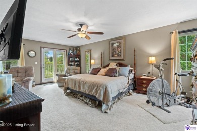 Experience tranquility and comfort in Brandenburg's premier on Doe Valley Country Club in Kentucky - for sale on GolfHomes.com, golf home, golf lot
