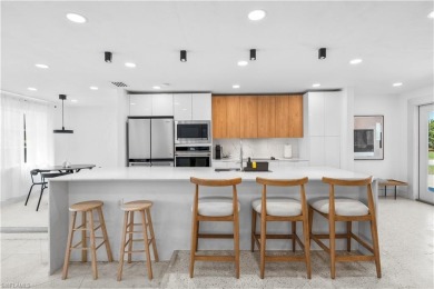 Renovated Mid-Century Modern Pool Home in the Heart of South on Whiskey Creek Country Club in Florida - for sale on GolfHomes.com, golf home, golf lot