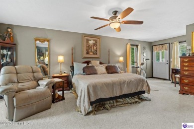 Experience tranquility and comfort in Brandenburg's premier on Doe Valley Country Club in Kentucky - for sale on GolfHomes.com, golf home, golf lot