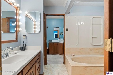 Experience tranquility and comfort in Brandenburg's premier on Doe Valley Country Club in Kentucky - for sale on GolfHomes.com, golf home, golf lot