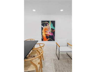 Renovated Mid-Century Modern Pool Home in the Heart of South on Whiskey Creek Country Club in Florida - for sale on GolfHomes.com, golf home, golf lot