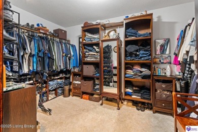Experience tranquility and comfort in Brandenburg's premier on Doe Valley Country Club in Kentucky - for sale on GolfHomes.com, golf home, golf lot