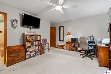 Experience tranquility and comfort in Brandenburg's premier on Doe Valley Country Club in Kentucky - for sale on GolfHomes.com, golf home, golf lot