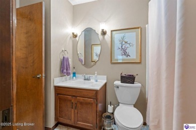 Experience tranquility and comfort in Brandenburg's premier on Doe Valley Country Club in Kentucky - for sale on GolfHomes.com, golf home, golf lot