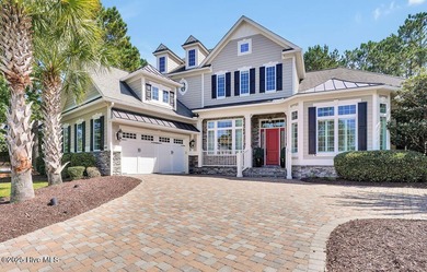 Discover refined luxury and timeless craftsmanship in this on Ocean Ridge Plantation in North Carolina - for sale on GolfHomes.com, golf home, golf lot