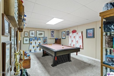 Experience tranquility and comfort in Brandenburg's premier on Doe Valley Country Club in Kentucky - for sale on GolfHomes.com, golf home, golf lot
