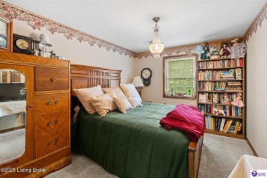 Experience tranquility and comfort in Brandenburg's premier on Doe Valley Country Club in Kentucky - for sale on GolfHomes.com, golf home, golf lot