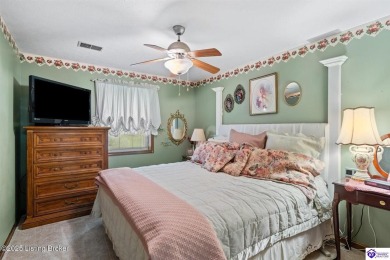 Experience tranquility and comfort in Brandenburg's premier on Doe Valley Country Club in Kentucky - for sale on GolfHomes.com, golf home, golf lot