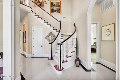 Discover refined luxury and timeless craftsmanship in this on Ocean Ridge Plantation in North Carolina - for sale on GolfHomes.com, golf home, golf lot