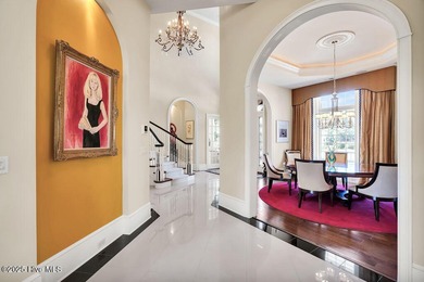 Discover refined luxury and timeless craftsmanship in this on Ocean Ridge Plantation in North Carolina - for sale on GolfHomes.com, golf home, golf lot