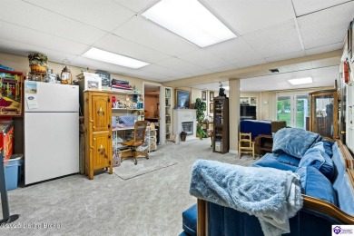 Experience tranquility and comfort in Brandenburg's premier on Doe Valley Country Club in Kentucky - for sale on GolfHomes.com, golf home, golf lot