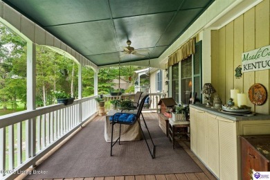 Experience tranquility and comfort in Brandenburg's premier on Doe Valley Country Club in Kentucky - for sale on GolfHomes.com, golf home, golf lot