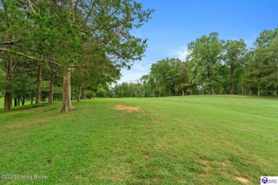 Experience tranquility and comfort in Brandenburg's premier on Doe Valley Country Club in Kentucky - for sale on GolfHomes.com, golf home, golf lot