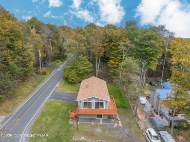 CHARMING UPGRADED POCONOS CHALET Completely Updated 3BR 2.5BA on Pocono Farms Country Club in Pennsylvania - for sale on GolfHomes.com, golf home, golf lot